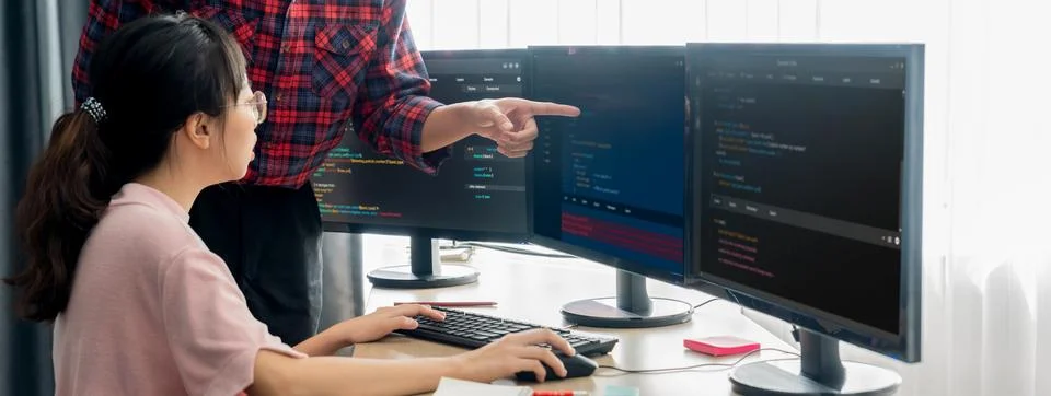 Professional programer team discuss about web coding at office. Burgeoning. Stock Photos