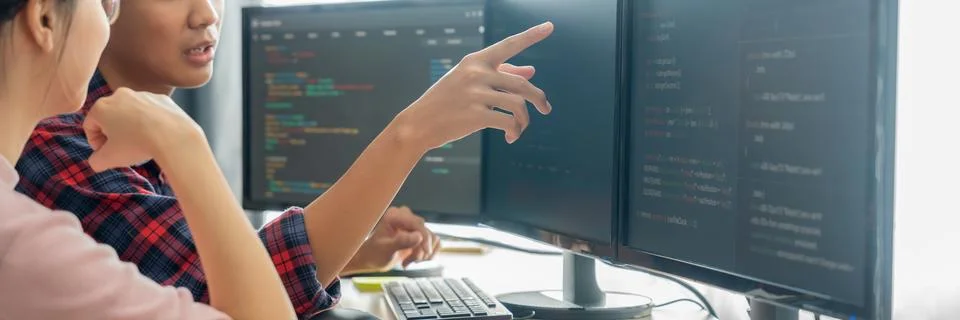 Professional programer team discuss about web coding at office. Burgeoning. Stock Photos