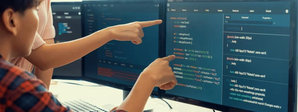 Professional programer team discuss about web coding at office. Burgeoning. Stock Photos