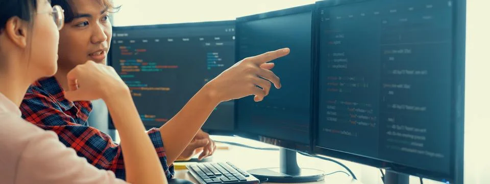 Professional programer team discuss about web coding at office. Burgeoning. Stock Photos