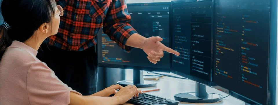 Professional programer team discuss about web coding at office. Burgeoning. Stock Photos