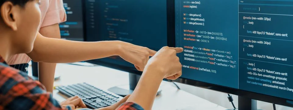 Professional programer team discuss about web coding at office. Burgeoning. Stock Photos