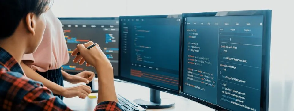 Professional programer team discuss about web coding at office. Burgeoning. Stock Photos