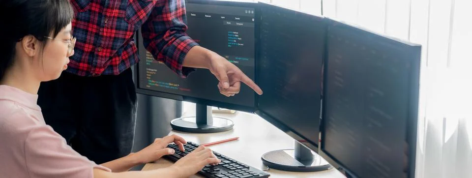 Professional programer team discuss about web coding at office. Burgeoning. Stock Photos