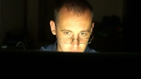 Professional programmer in glasses is working on computer in cyber security Video stock 77165818