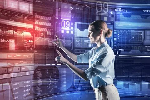 Professional programmer smiling and looking glad while working Stock Photos
