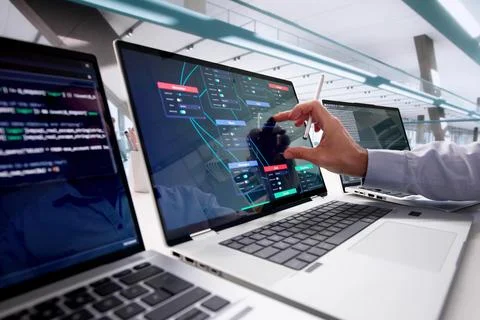 Professional Programmer Using Node Editor For Visual Scripting And Training Stock Photos