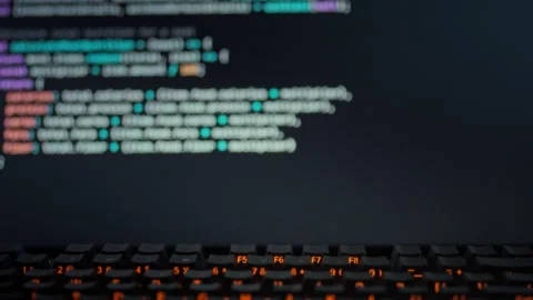 Professional programmer views AI model on computer screen as it dynamically Stock Footage 334075569