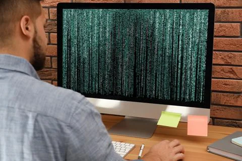 Professional programmer working with computer in office, closeup Stock Photos