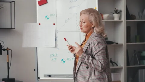 Professional property developer talking about building plan during online call Stock Footage 256326735