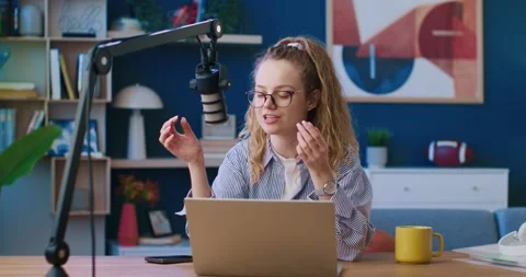 Professional radio host using microphone. Female wearing glasses and talking in Video stock 269508271