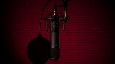 Professional recording sound studio microphone panning shot isolated at red 動画素材 103548364
