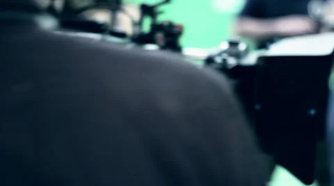 A professional red camera on dolly tracks Stock Footage 27319874