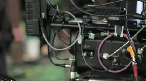 Professional red camera on dolly tracks Stock Footage 27320235