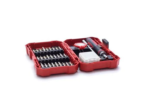 Professional red screwdriver set with bits for repair and assembly tasks. Foto stock