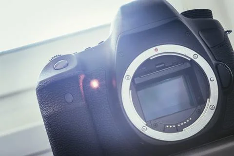 Professional reflex camera on a table, camera sensor Stock Photos