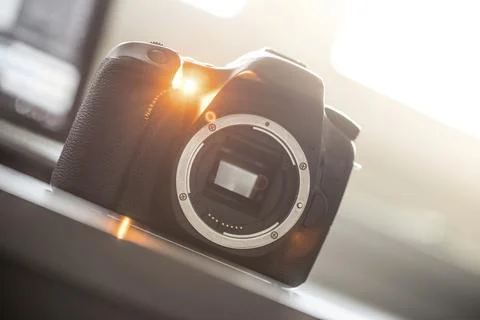 Professional reflex camera on a table, camera sensor Stock Photos