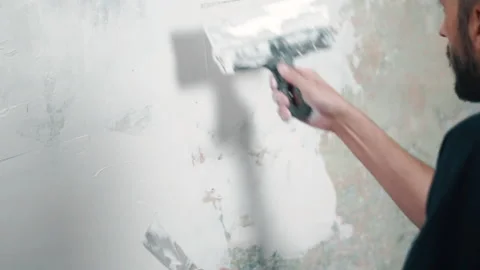 Professional repairman plastering wall, using spatula Video stock 212774155