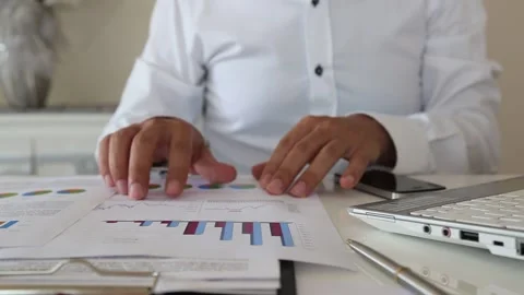 Professional Reviewing Financial Documents and Entering Data Stock Footage 346182582