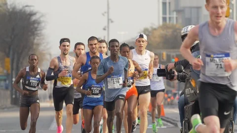 Professional Runners at the Head of a Half Marathon in Barcelona.  Athletes  Stock Footage 125119912