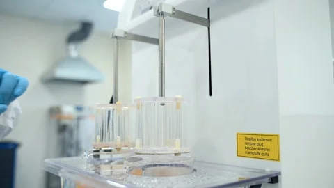 Professional scientist worker making tablet dissolution test. spbas scientist Stock Footage 128292314