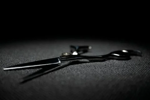 Professional scissors on black background Stock Photos