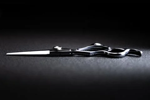 Professional scissors on black background Stock Photos