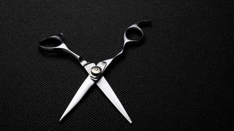 Professional scissors on black background 스톡 사진