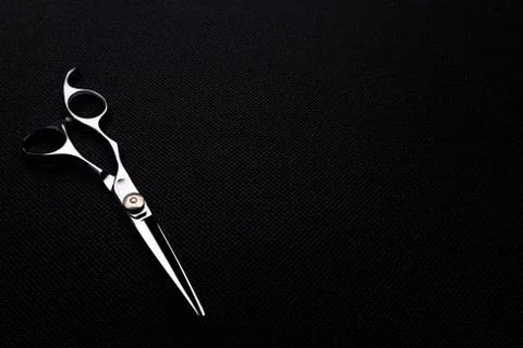 Professional scissors on black background Foto stock