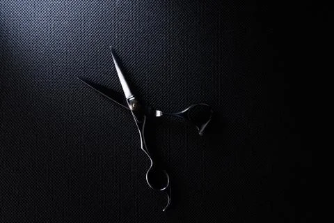 Professional scissors on black background Stock Photos