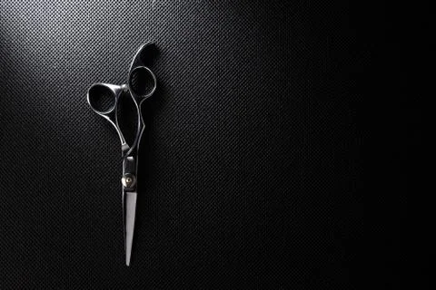 Professional scissors on black background 写真素材
