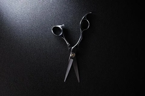 Professional scissors on black background 스톡 사진
