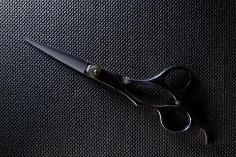 Professional scissors on black background Stock Photos