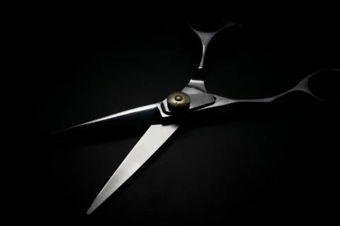 Professional scissors on black background Stock Photos