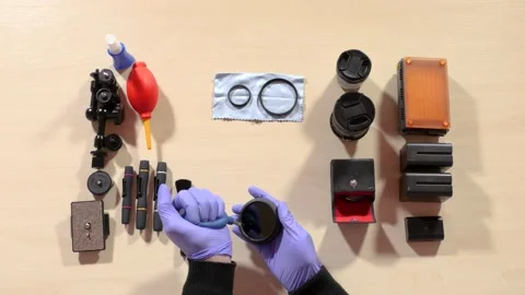 Professional serviceman cleans the lens Stock Footage 236285715