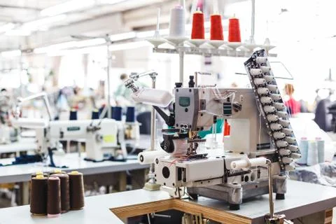 Professional sewing machine with different colors of threads Foto stock