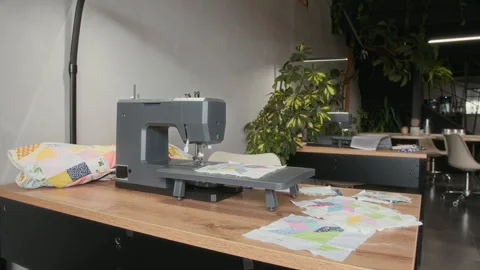 Professional Sewing Machine with Patchwork Quilt in Workshop Stock Footage 315773002