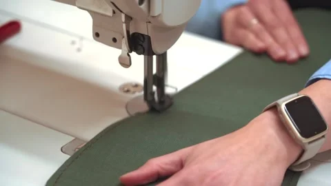 Professional sewing process on industrial machine Stock Footage 321287797