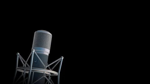 Professional silver microphone slowly rotating on black background Stock Footage 71458355