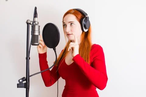 The professional singer is preparing to record a new song Stock Photos