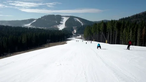 Professional Skier Carving Down the Snowy Slopes on the Mountain With Clear 動画素材 74161789
