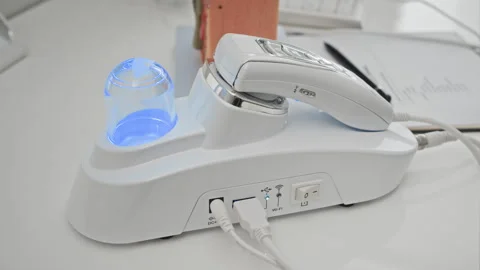 Professional Skin Analyzer Device Glowing with Blue Light in Clinic Stock Footage 337176348