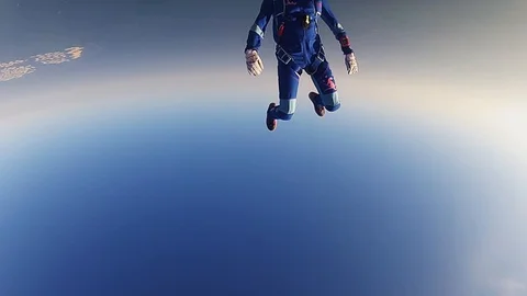 Professional skydiver fly in blue sky above Dubai. Sunny. Opening parachute. Stock Footage 95945230