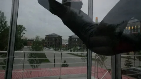 Professional skydiver making acrobatic stunt in wind tunnel. Extreme parachuting 動画素材 82239446