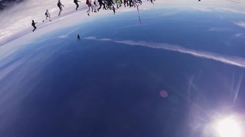 Professional skydivers parachuting, make big formation. Sunny day. Extreme stunt Stock Footage 64335285