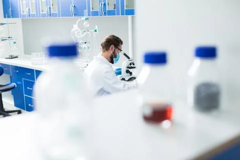 Professional smart scientist being at work Stock Photos