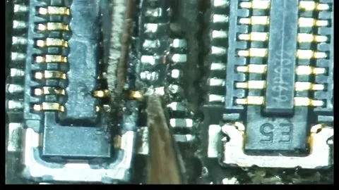 ​Professional smartphone repair under microscope Video stock 331407793