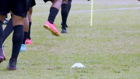 Professional soccer players practice a skill drill - slow motion Stock Footage 232360091