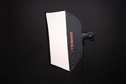 Professional softbox over black background. A dark black studio softbox 70 to 90 Stock Photos