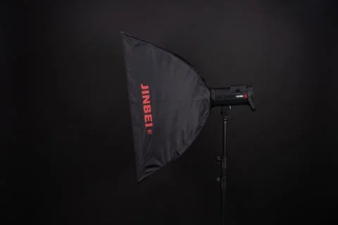 Professional softbox over black background. A dark black studio softbox 70 to 90 Stock Photos